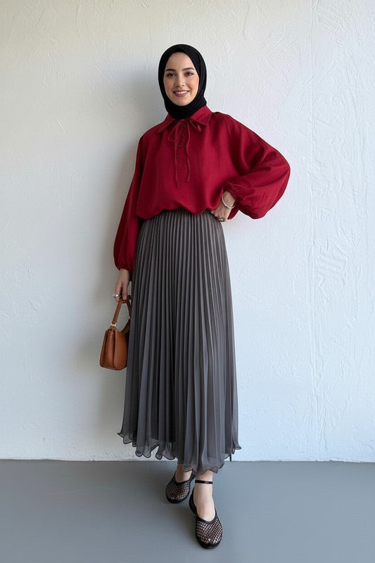 Cherianne.com gray pleated chiffon maxi skirt paired with a red long-sleeve blouse and black hijab