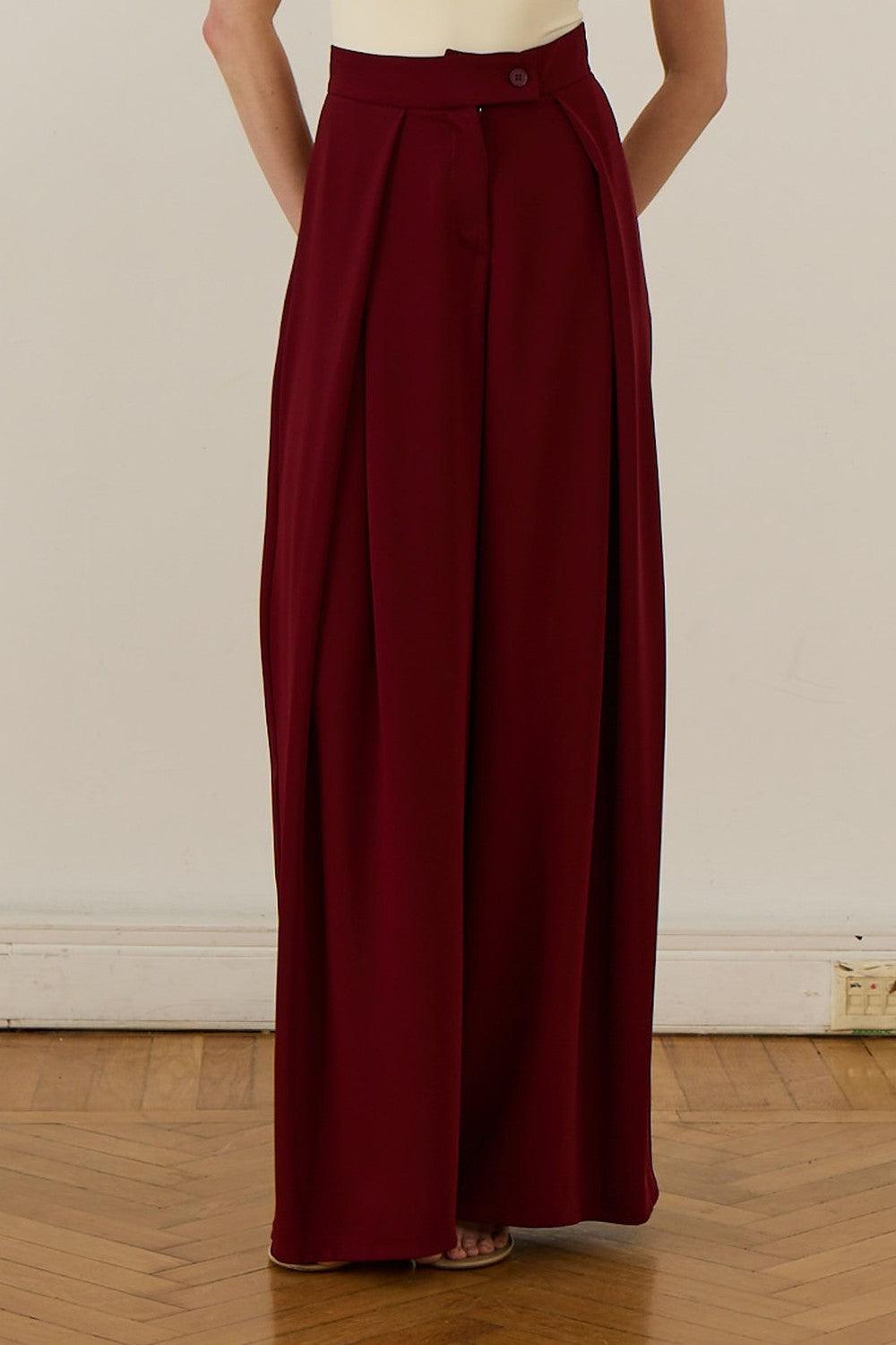 Cherianne.com high-waisted burgundy wide-leg trousers with pleated ruffle detail and side pockets