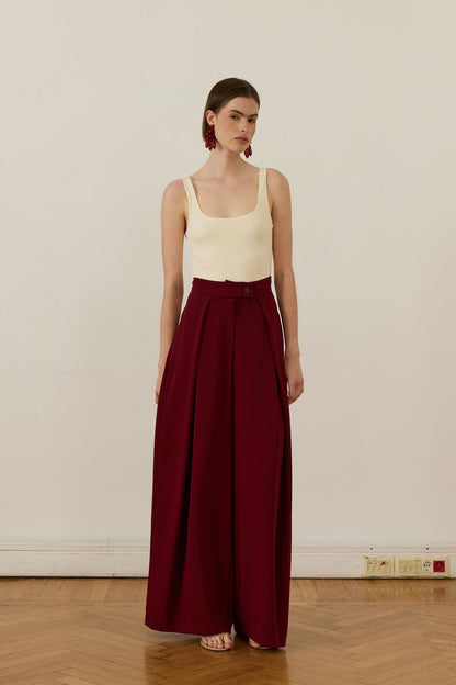 Cherianne.com high-waisted burgundy wide-leg trousers with pleated ruffle detail and side pockets