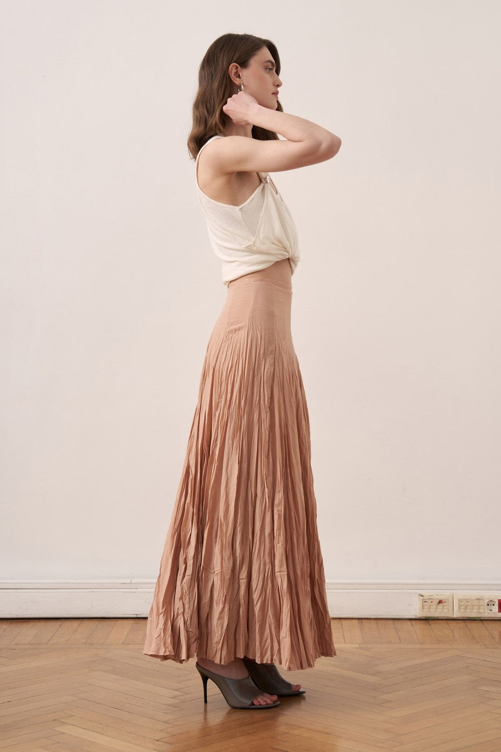 Cherianne.com Tyra maxi skirt in crushed cotton voile with a high-waisted paneled design in a soft nude tone.