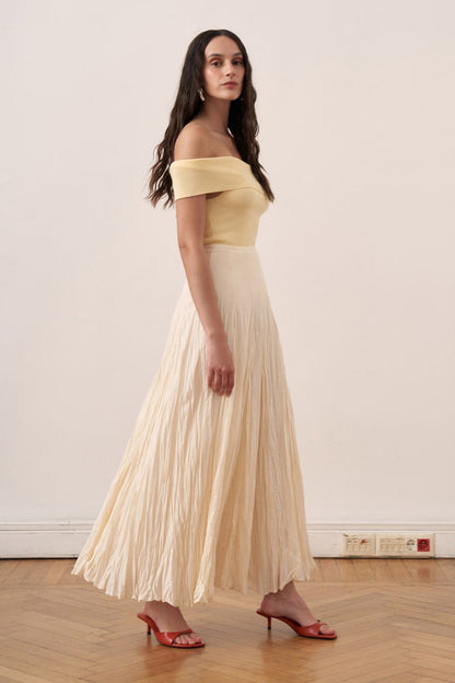 Cherianne.com Tyra cream cotton voile maxi skirt with a textured crushed finish and high-waisted paneled design.