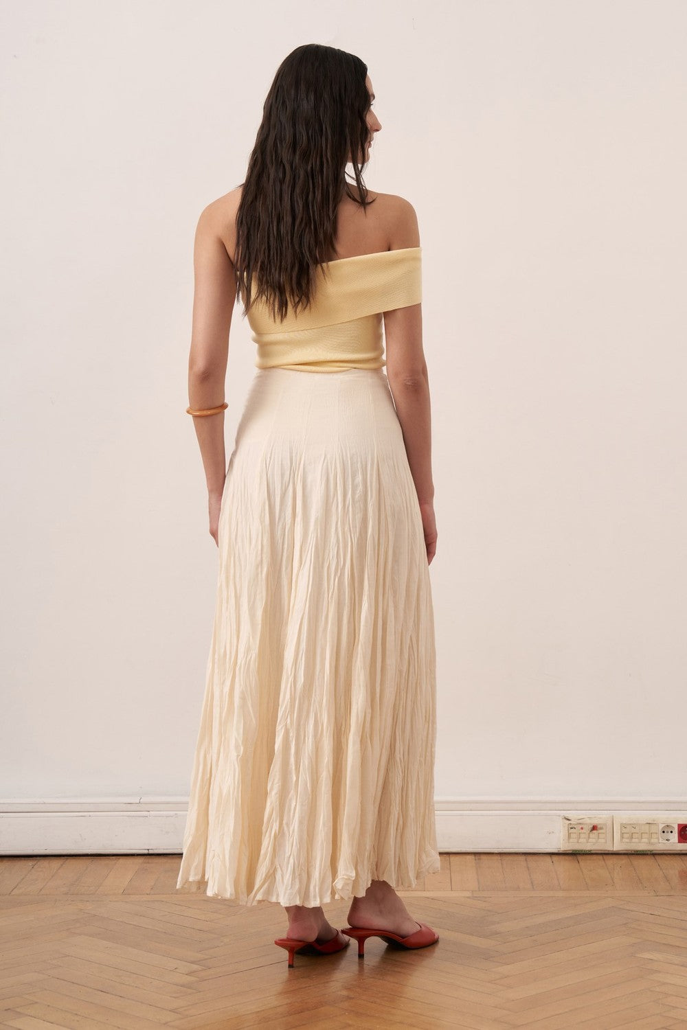 Cherianne.com Tyra cream cotton voile maxi skirt with a textured crushed finish and high-waisted paneled design.