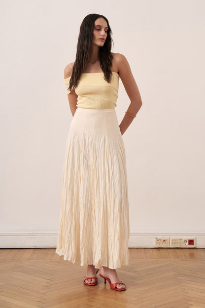 Cherianne.com Tyra cream cotton voile maxi skirt with a textured crushed finish and high-waisted paneled design.