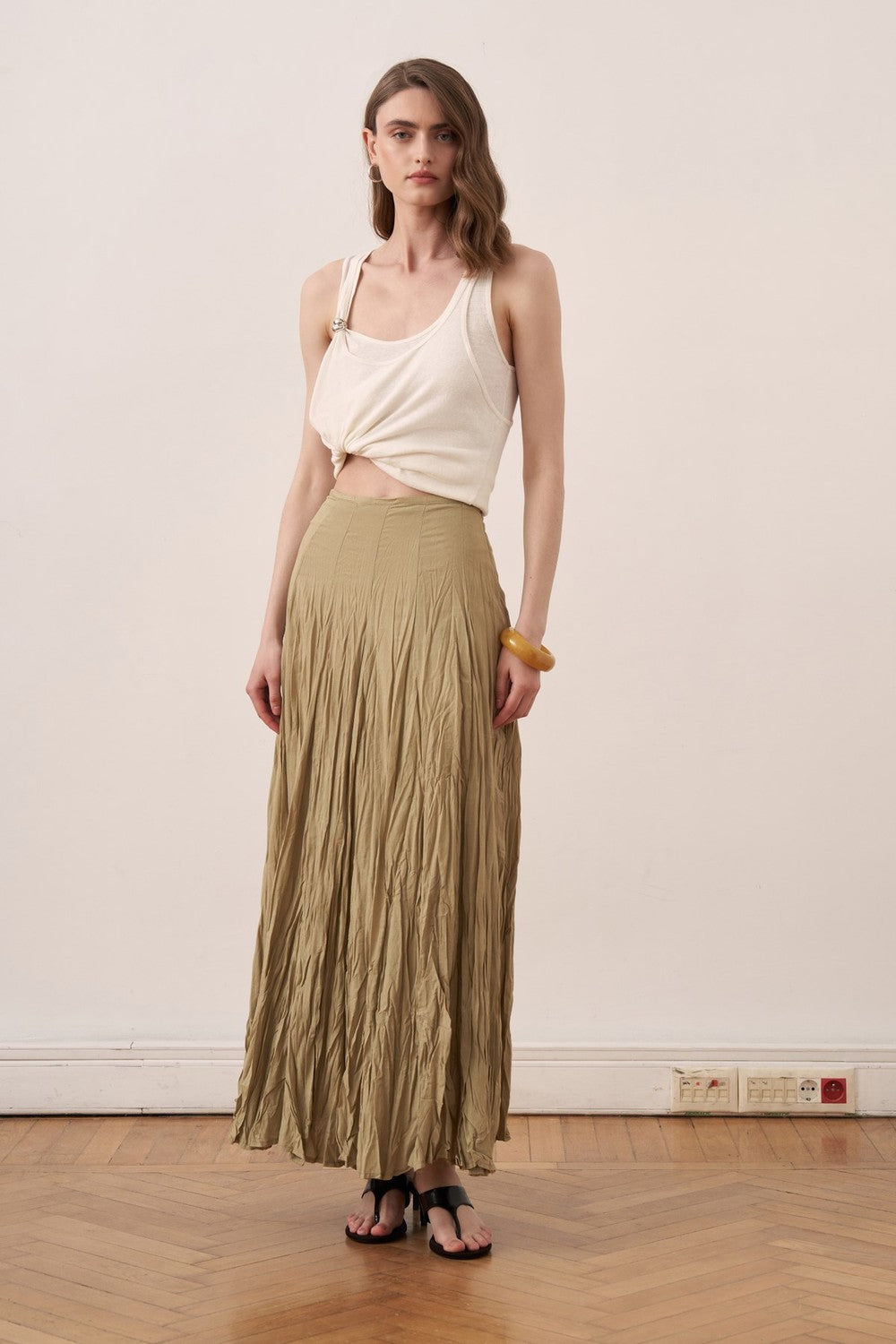 Cherianne.com olive green cotton voile maxi skirt with a crushed crinkle texture and high-waisted paneled design.