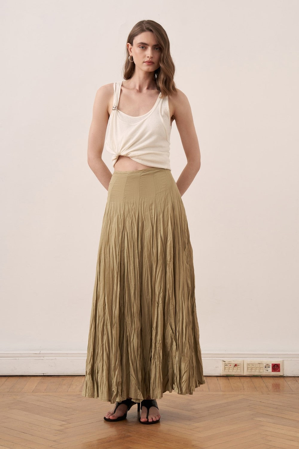 Cherianne.com olive green cotton voile maxi skirt with a crushed crinkle texture and high-waisted paneled design.