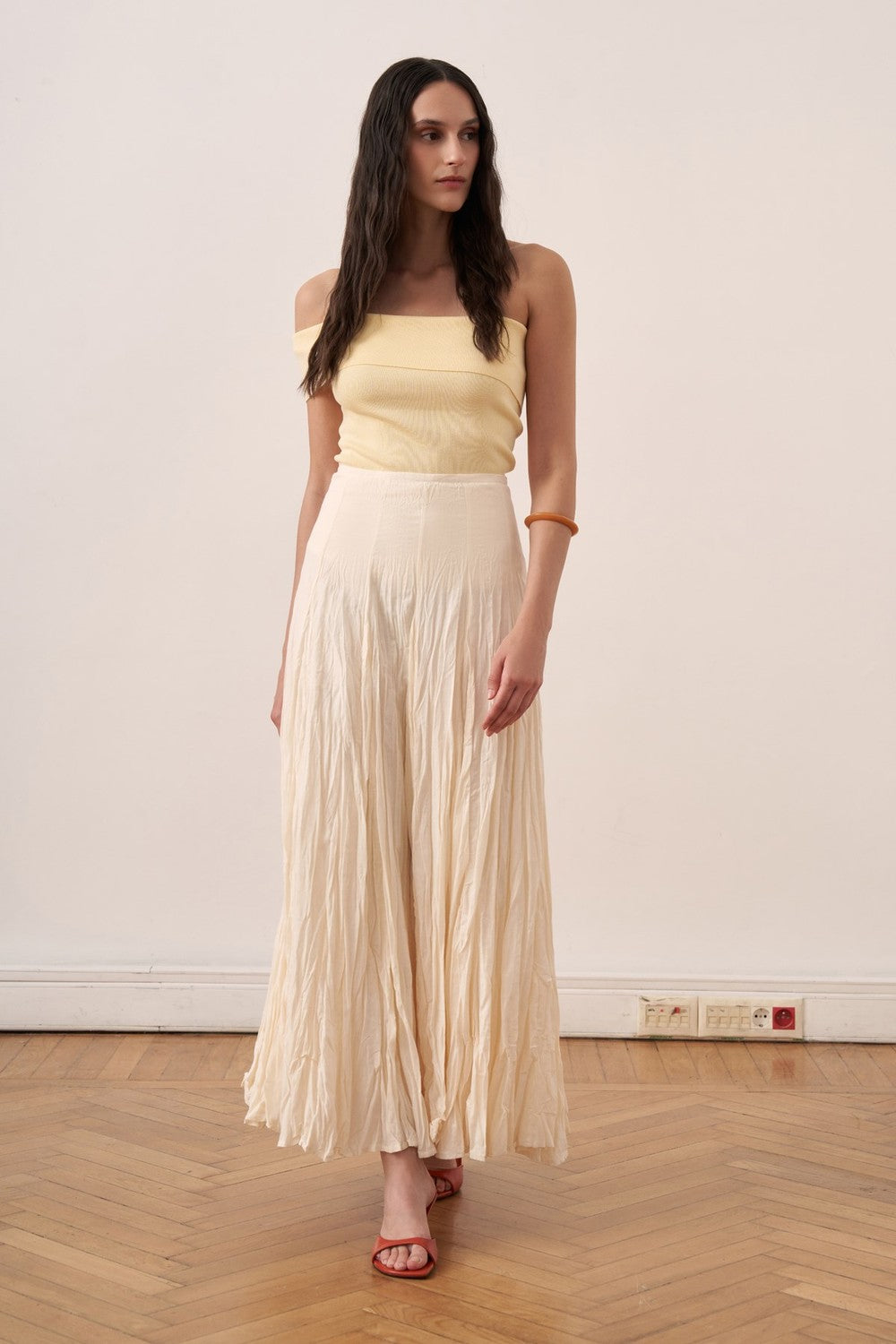 Cherianne.com Tyra cream cotton voile maxi skirt with a textured crushed finish and high-waisted paneled design.