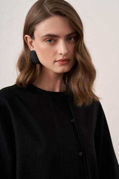 Cherianne.com black linen blend shirt with mandarin collar, asymmetric button placket, and relaxed drop shoulder fit.