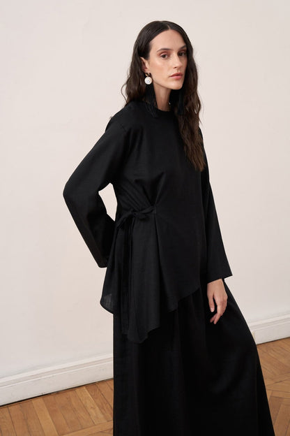 Cherianne.com black two-piece linen blend dress set featuring an asymmetric long-sleeve tunic with side tie detail.