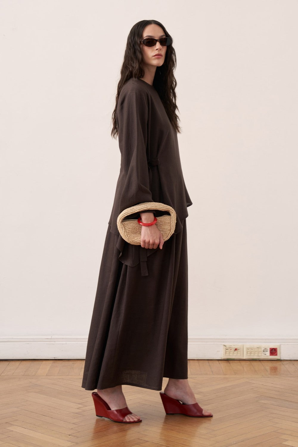 Cherianne.com dark brown linen two-piece maxi dress set with asymmetric tunic and sleeveless dress on a model