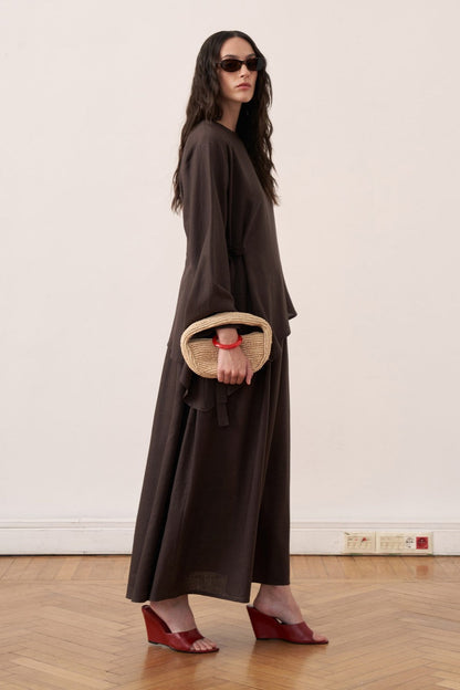 Cherianne.com dark brown linen two-piece maxi dress set with asymmetric tunic and sleeveless dress on a model