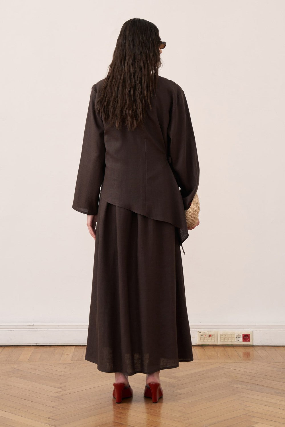 Cherianne.com dark brown linen two-piece maxi dress set with an asymmetric tunic and sleeveless dress, back view.