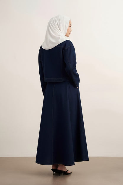 Cherianne.com navy blue denim two-piece skirt set with a button-up jacket worn by a woman in a white hijab