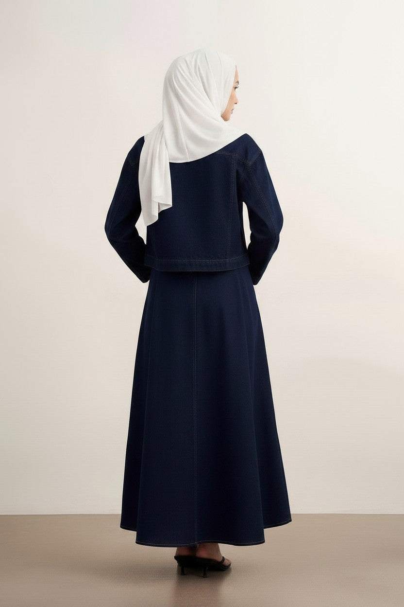 Cherianne.com navy blue denim two-piece set with a buttoned jacket and long skirt worn by a model in a white hijab.