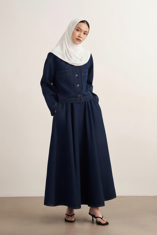 Cherianne.com navy blue denim two-piece set with button-up shirt and pleated maxi skirt worn by a model in hijab.