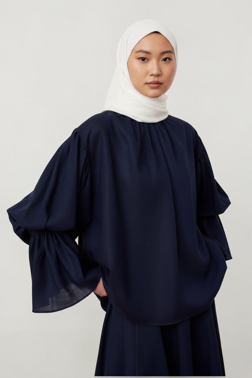 Cherianne.com navy blue linen-blend blouse with gathered collar, voluminous balloon sleeves, and a relaxed fit.