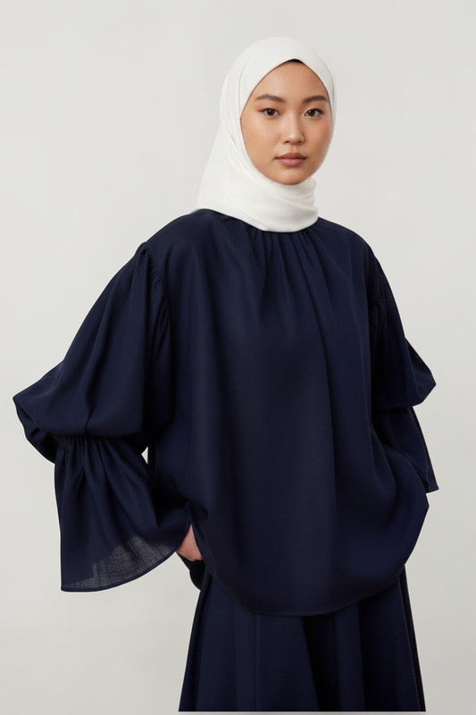 Cherianne.com navy blue linen-blend blouse with gathered collar, voluminous balloon sleeves, and a relaxed fit.