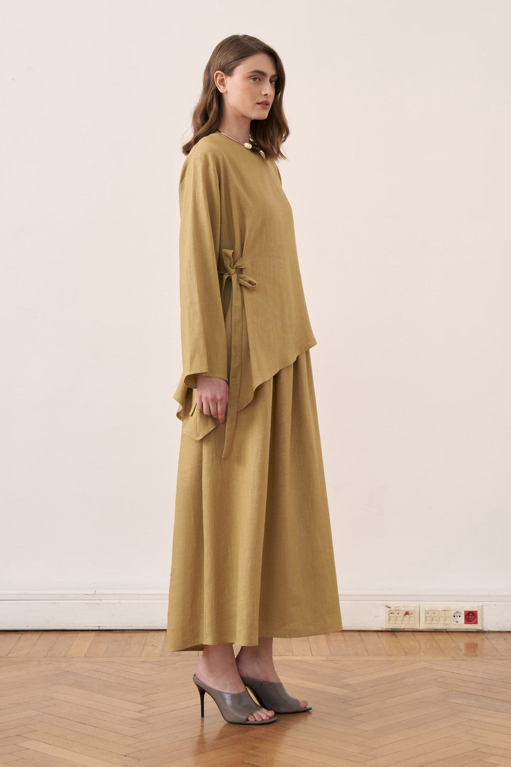 Cherianne.com two-piece linen blend dress set in mustard yellow with an asymmetric side-tie tunic and maxi dress.