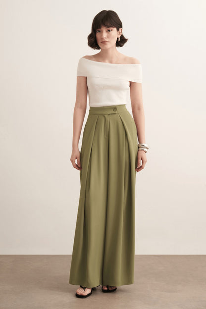 Cherianne.com Leona high-waisted wide-leg olive green trousers with pleated detail worn by a model